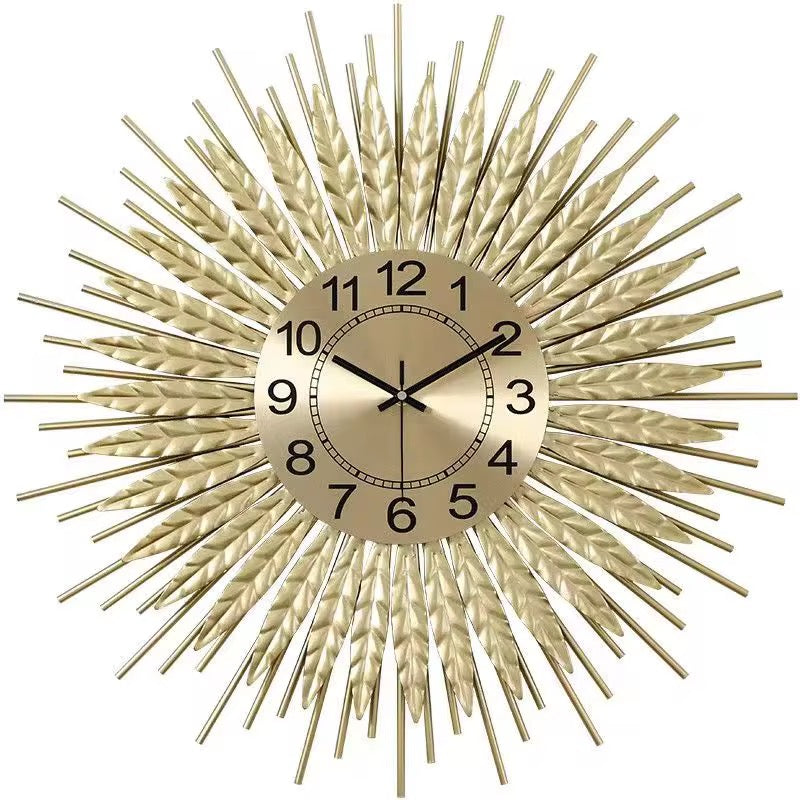Solea – Luxe wandklok in zonnestraaldesign | Gouden statement piece