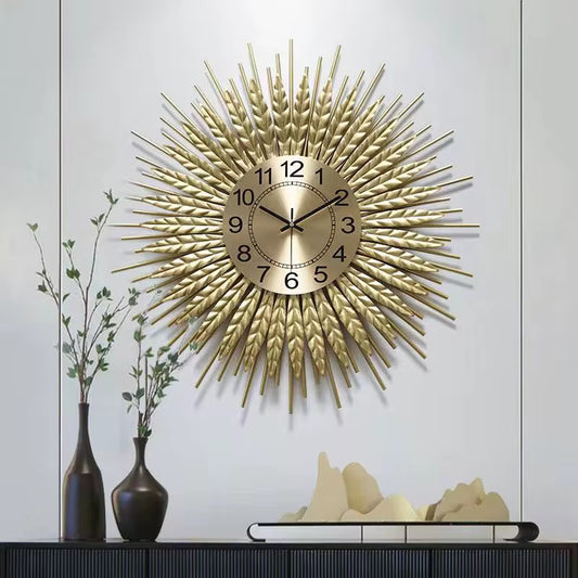 Solea – Luxe wandklok in zonnestraaldesign | Gouden statement piece