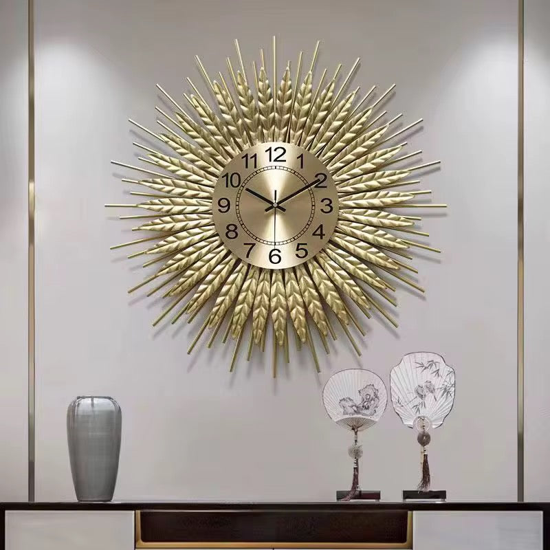 Solea – Luxe wandklok in zonnestraaldesign | Gouden statement piece