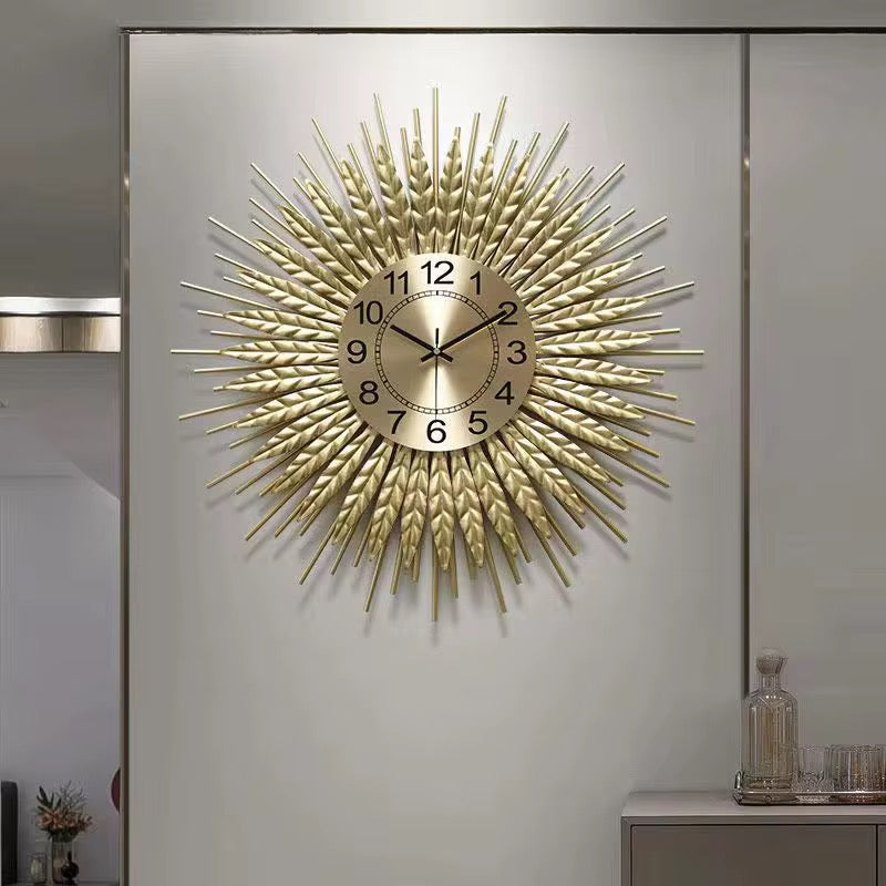 Solea – Luxe wandklok in zonnestraaldesign | Gouden statement piece