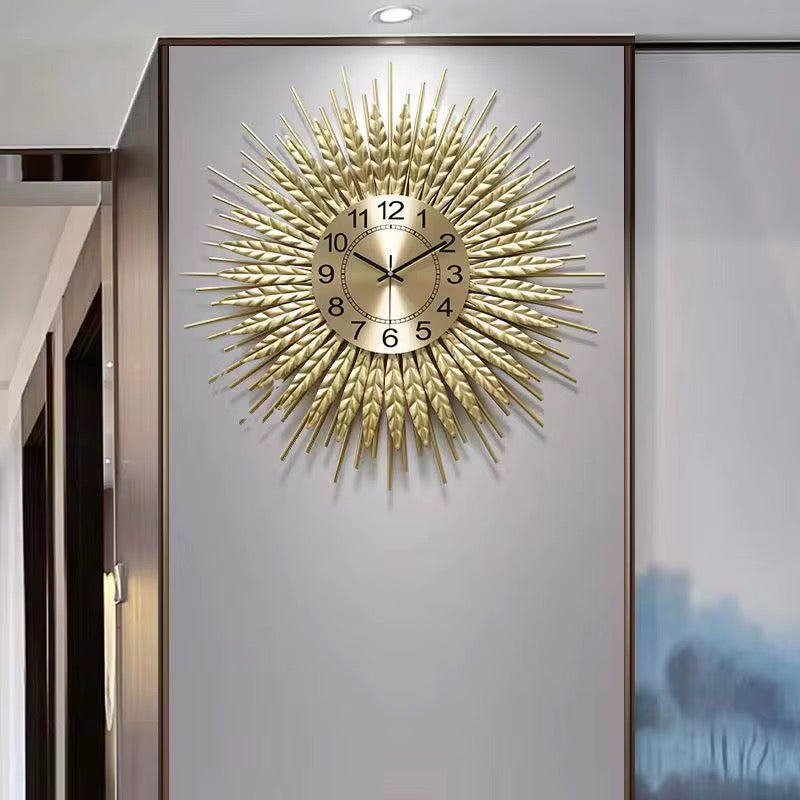 Solea – Luxe wandklok in zonnestraaldesign | Gouden statement piece
